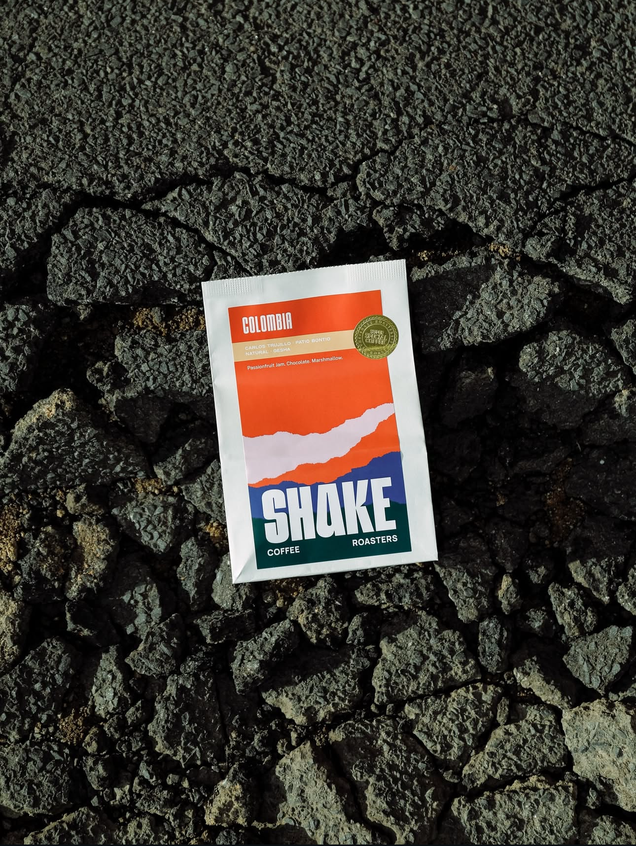 Shake coffee package on a textured surface